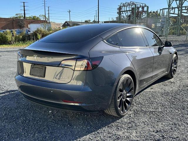 Photo of 2022 Midnight Silver Metallic Tesla Model 3