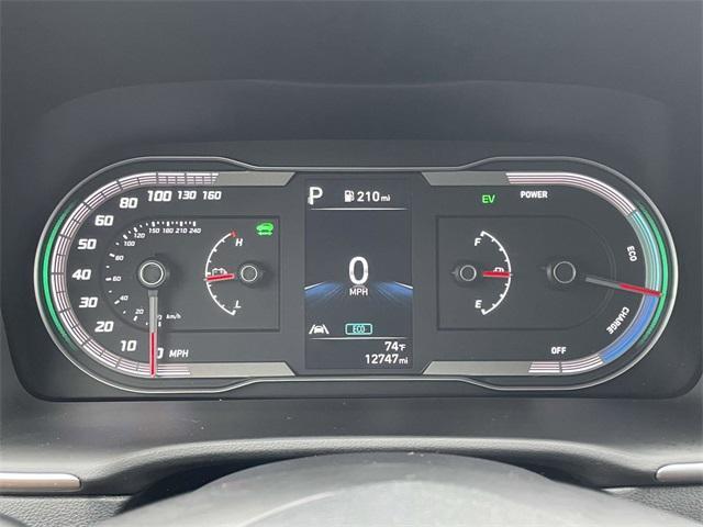 Photo of 2024 White Pearl Hyundai TUCSON Hybrid