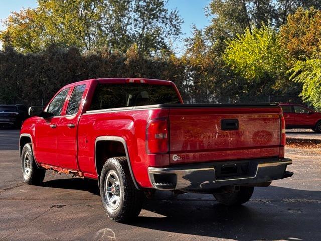 Photo of 2014 Fire Red GMC Sierra 1500