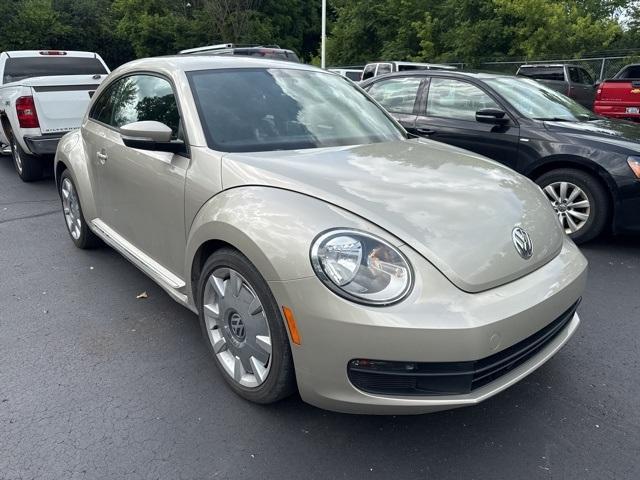 Photo of 2012 Gold Volkswagen Beetle