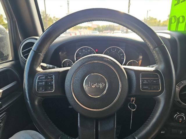 Photo of 2017 Granite Crystal Metallic Clearcoat Jeep Wrangler Unlimited