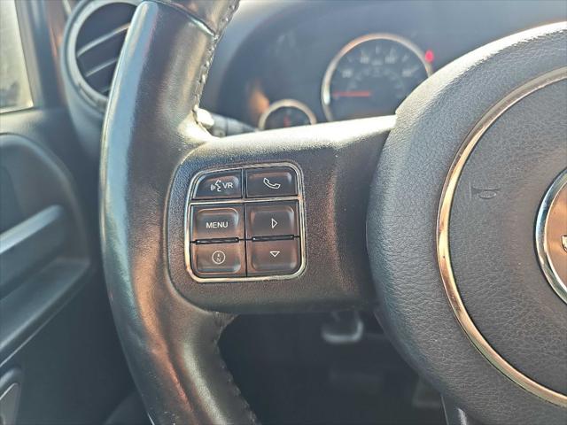 Photo of 2017 Granite Crystal Metallic Clearcoat Jeep Wrangler Unlimited