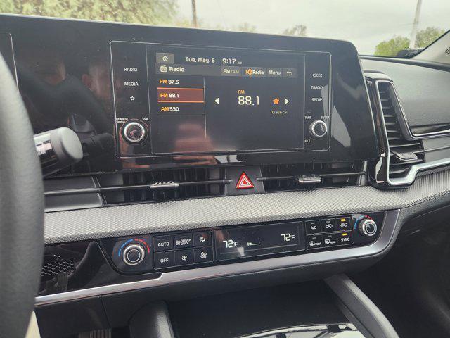 Photo of 2025 Fusion Black Kia Sportage Hybrid