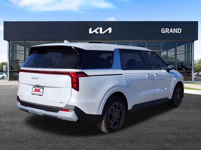 Photo of 2026 Snow White Pearl Kia Carnival Hybrid