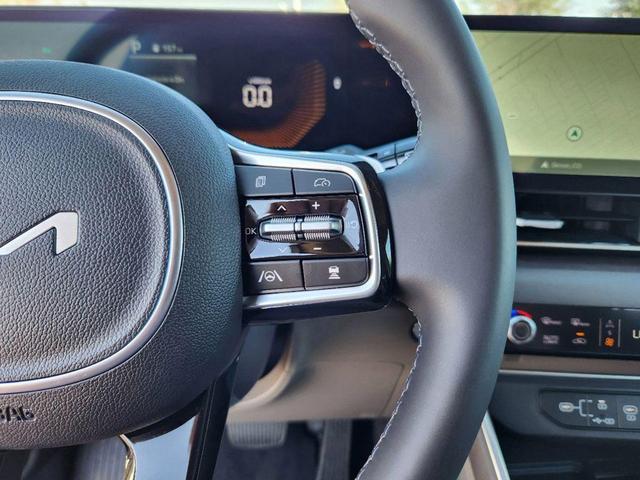 Photo of 2026 Snow White Pearl Kia Carnival Hybrid