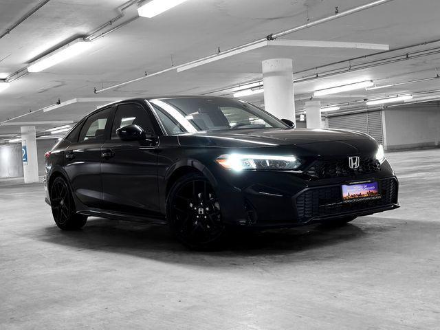 Photo of 2026 Blue Lagoon Pearl Honda Civic