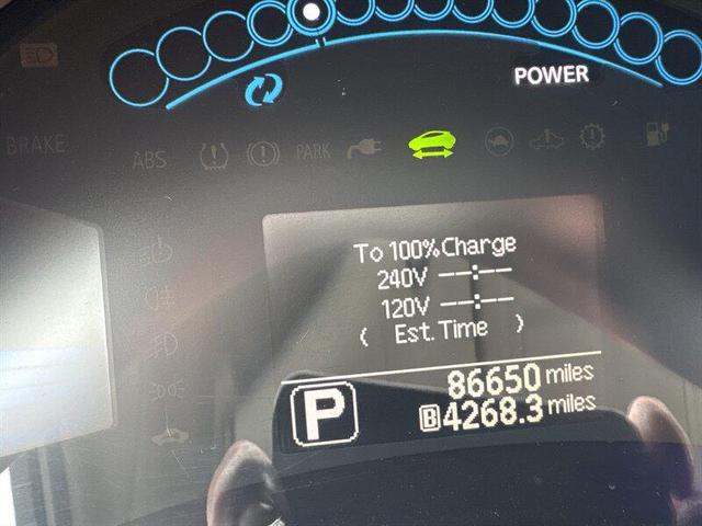 Photo of 2012 Cayenne Red Nissan Leaf