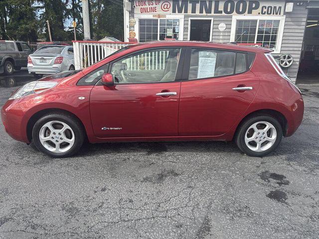 Photo of 2012 Cayenne Red Nissan Leaf