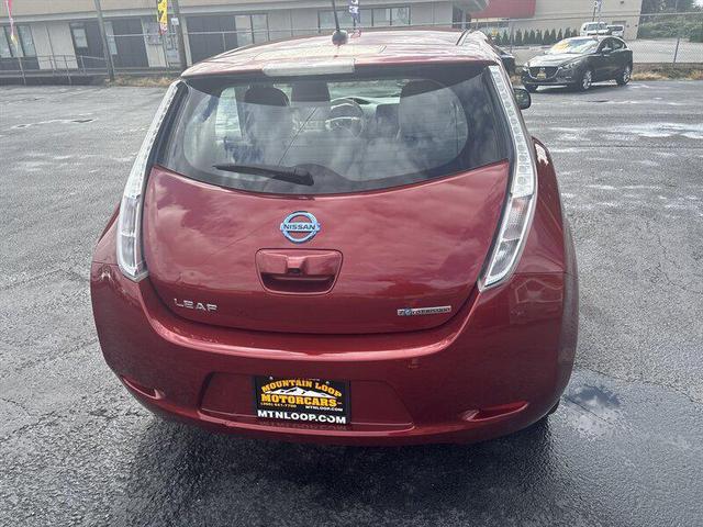 Photo of 2012 Cayenne Red Nissan Leaf