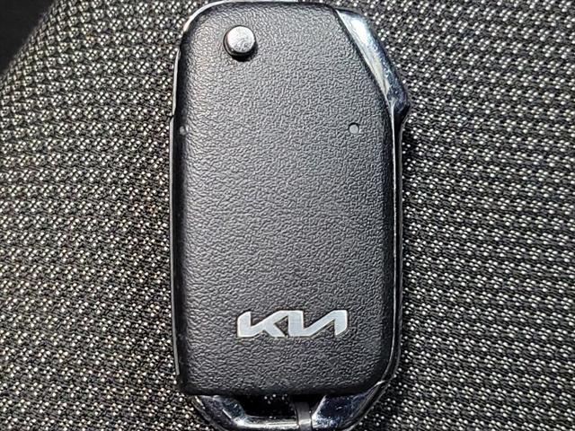 Photo of 2023 Currant Red Kia Forte