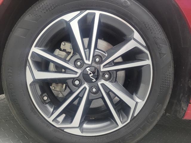 Photo of 2023 Currant Red Kia Forte