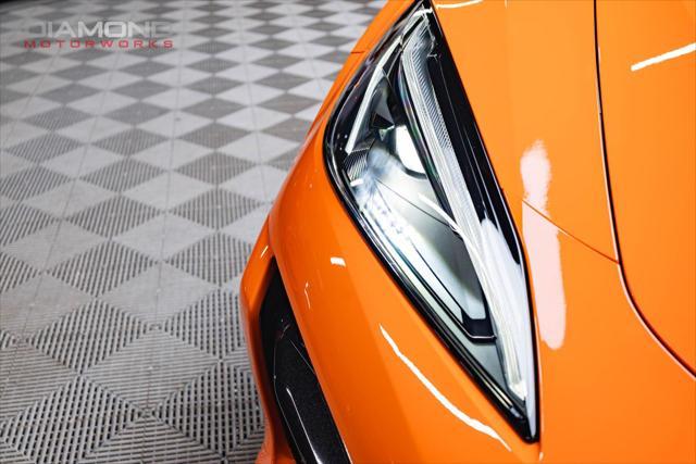 Photo of 2024 Amplify Orange Tintcoat Chevrolet Corvette