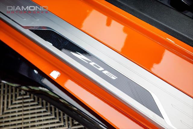 Photo of 2024 Amplify Orange Tintcoat Chevrolet Corvette