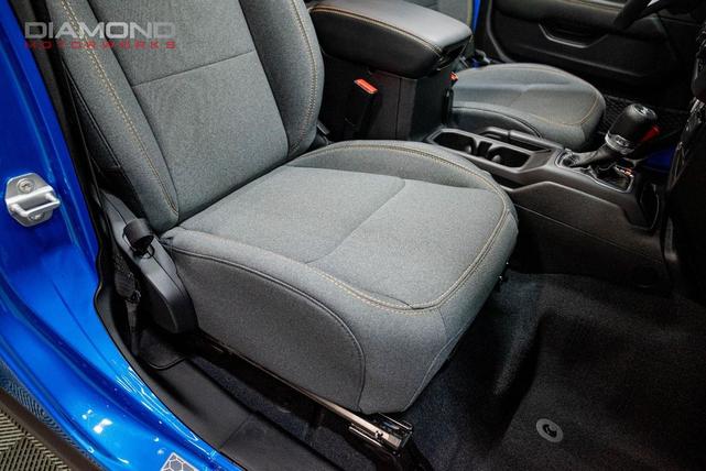 Photo of 2024 Hydro Blue Pearl Coat Jeep Wrangler