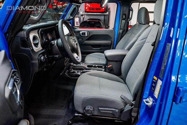 Photo of 2024 Hydro Blue Pearl Coat Jeep Wrangler