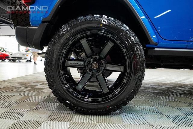 Photo of 2024 Hydro Blue Pearl Coat Jeep Wrangler