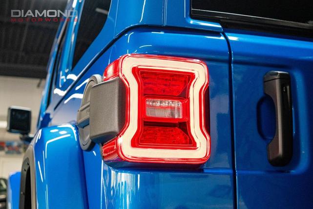 Photo of 2024 Hydro Blue Pearl Coat Jeep Wrangler