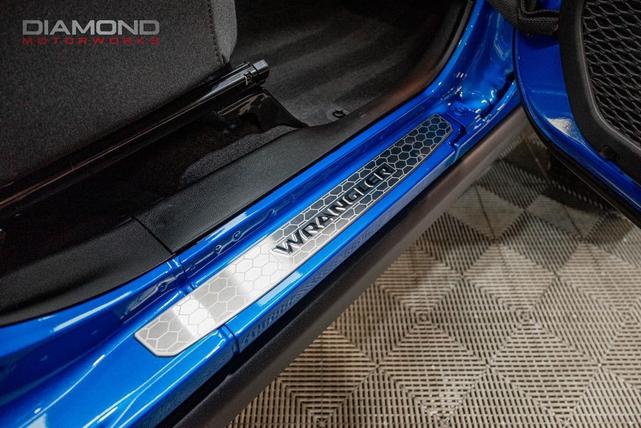 Photo of 2024 Hydro Blue Pearl Coat Jeep Wrangler