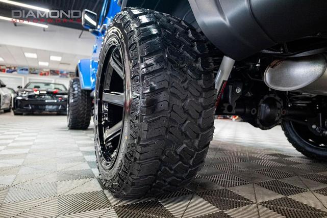 Photo of 2024 Hydro Blue Pearl Coat Jeep Wrangler