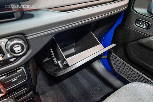 Photo of 2024 Hydro Blue Pearl Coat Jeep Wrangler