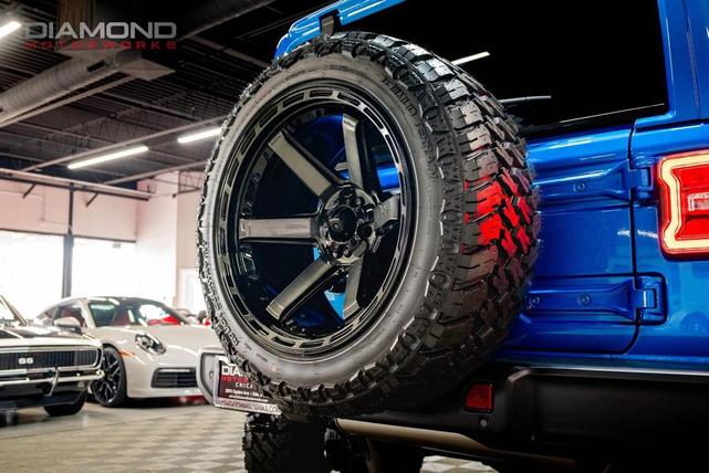 Photo of 2024 Hydro Blue Pearl Coat Jeep Wrangler