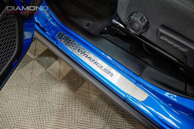 Photo of 2024 Hydro Blue Pearl Coat Jeep Wrangler