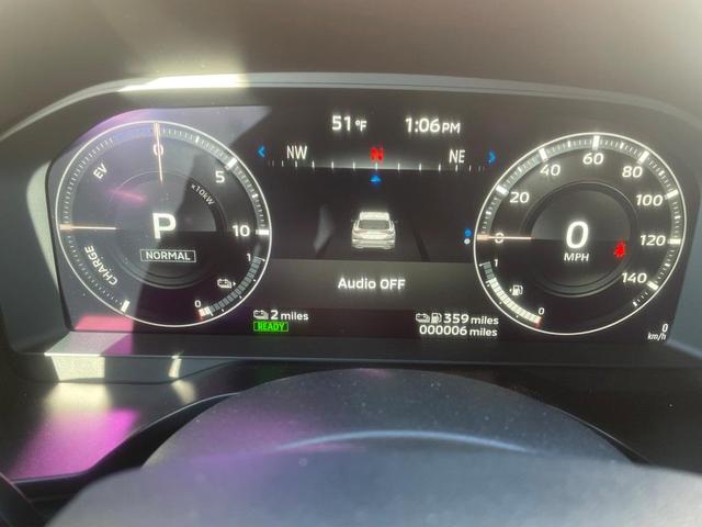 Photo of 2025 White Diamond Mitsubishi Outlander PHEV