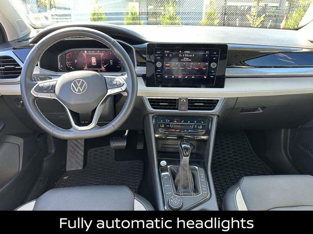 Photo of 2025 Pure White Volkswagen Taos