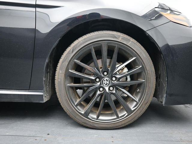 Photo of 2023 Midnight Black Metallic Toyota Camry