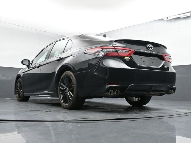Photo of 2023 Midnight Black Metallic Toyota Camry