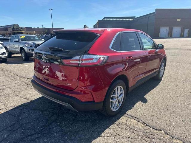 Photo of 2023 Rapid Red Metallic Tinted Clearcoat Ford Edge
