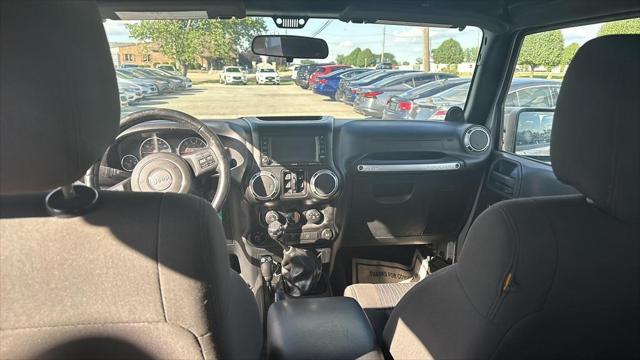 Photo of 2011 Bright Silver Metallic Clearcoat Jeep Wrangler Unlimited