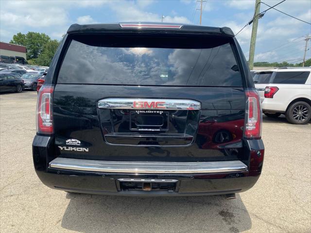 Photo of 2015 Black GMC Yukon
