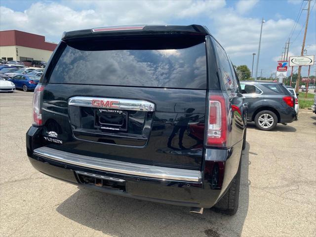 Photo of 2015 Black GMC Yukon