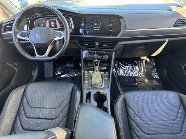 Photo of 2023 Kings Red Metallic Volkswagen Jetta