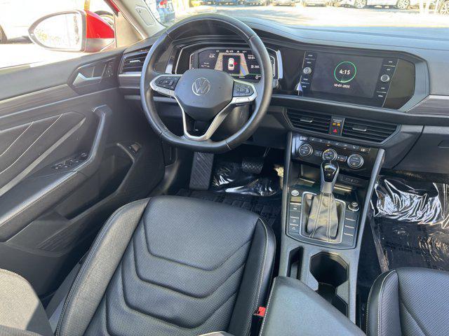 Photo of 2023 Kings Red Metallic Volkswagen Jetta