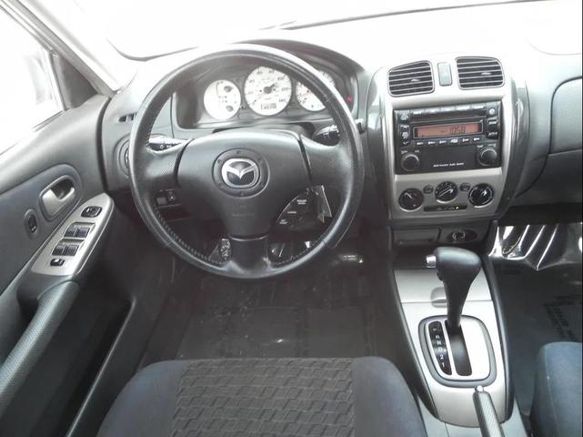 Photo of 2002 Pure White Mazda Protege5