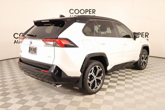 Photo of 2024 Wind Chill Pearl/Midnight Black Metallic Toyota RAV4 Prime