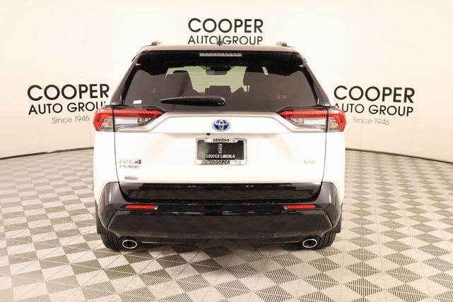 Photo of 2024 Wind Chill Pearl/Midnight Black Metallic Toyota RAV4 Prime