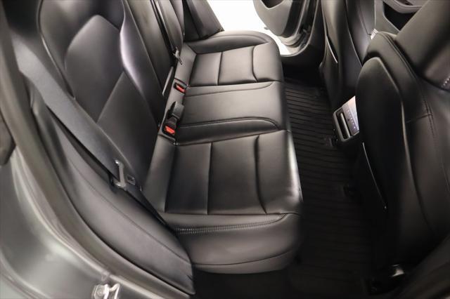 Photo of 2025 Stealth Grey Tesla Model 3