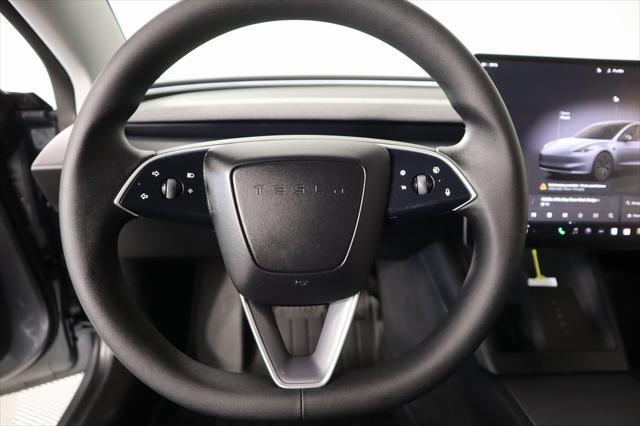 Photo of 2025 Stealth Grey Tesla Model 3