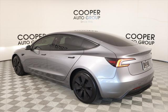 Photo of 2025 Stealth Grey Tesla Model 3