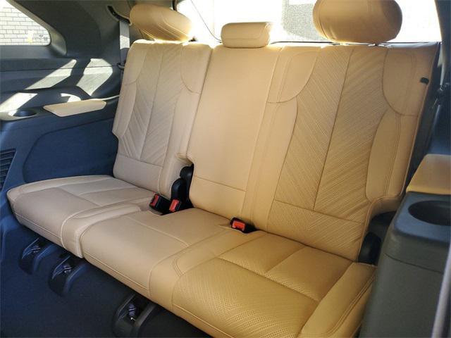 Photo of 2025 Black Raven Cadillac Escalade IQ
