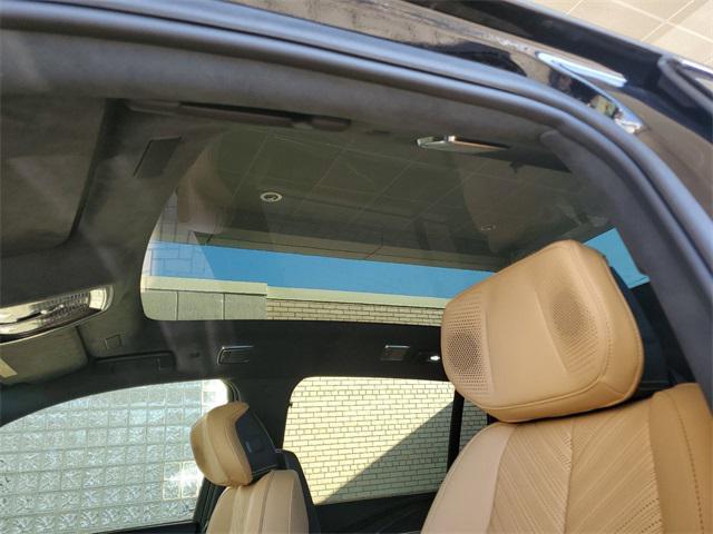 Photo of 2025 Black Raven Cadillac Escalade IQ