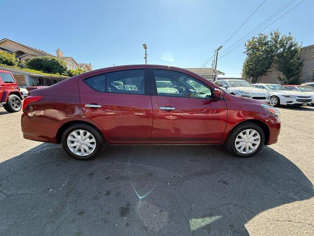 Photo of 2018 Cayenne Red Nissan Versa