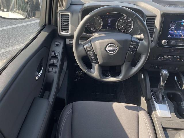 Photo of 2024 Glacier White Nissan Frontier