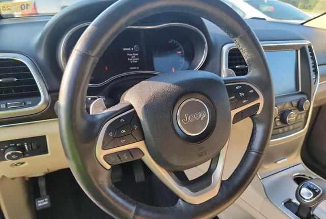 Photo of 2015 Bright White Clearcoat Jeep Grand Cherokee