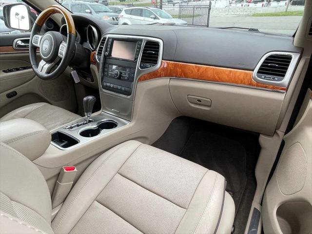 Photo of 2012 Deep Cherry Red Crystal Pearl Jeep Grand Cherokee