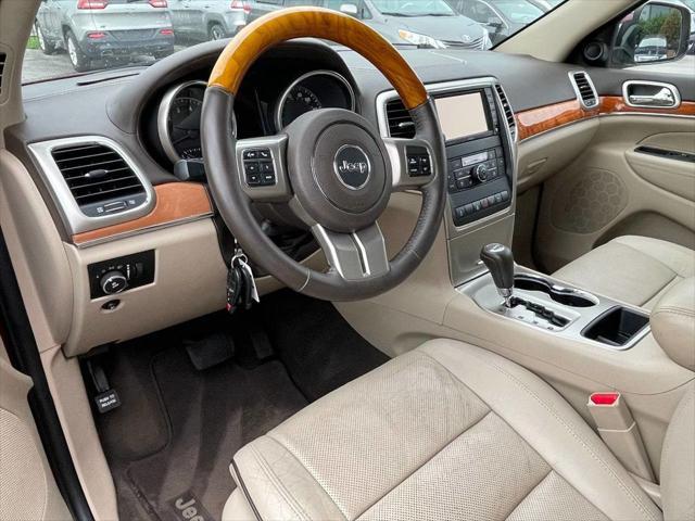 Photo of 2012 Deep Cherry Red Crystal Pearl Jeep Grand Cherokee