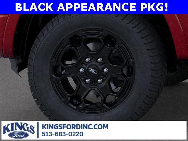 Photo of 2025 Ruby Red Metallic Tinted Clearcoat Ford Ranger
